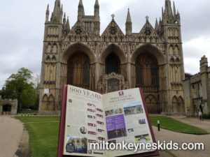 Large book sculpture in front of Peterborough Cathedral