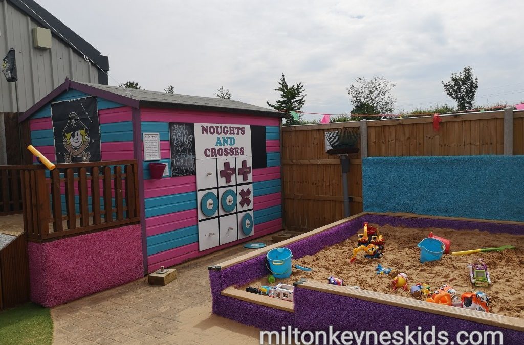 Sandpit and noughts and crosses game at Poplars Garden Centre in Bedfordshire