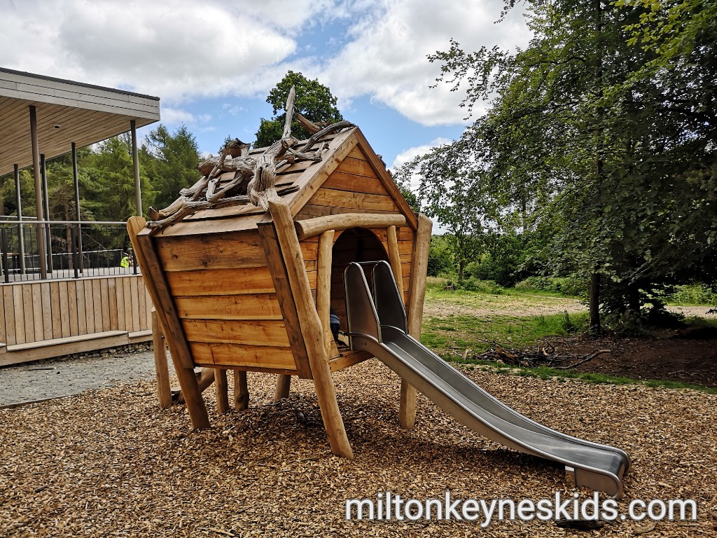 Wooden toddler play house with slide at Wendover Woods