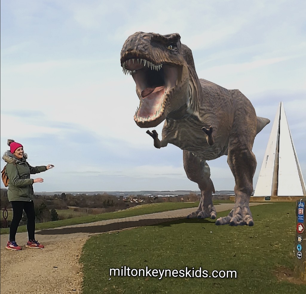 Person with augmented reality dinosaur